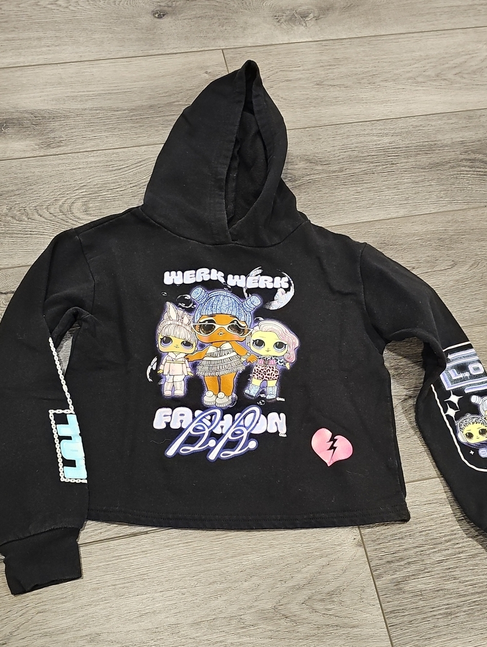L.O.L. Surprise! Black Hoodie with Colorful Doll Graphic